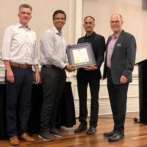 Doctor receiving an award at a ceremony